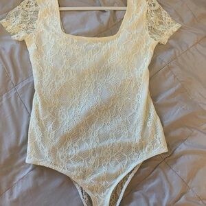 Elegant Cream Lace Bodysuit